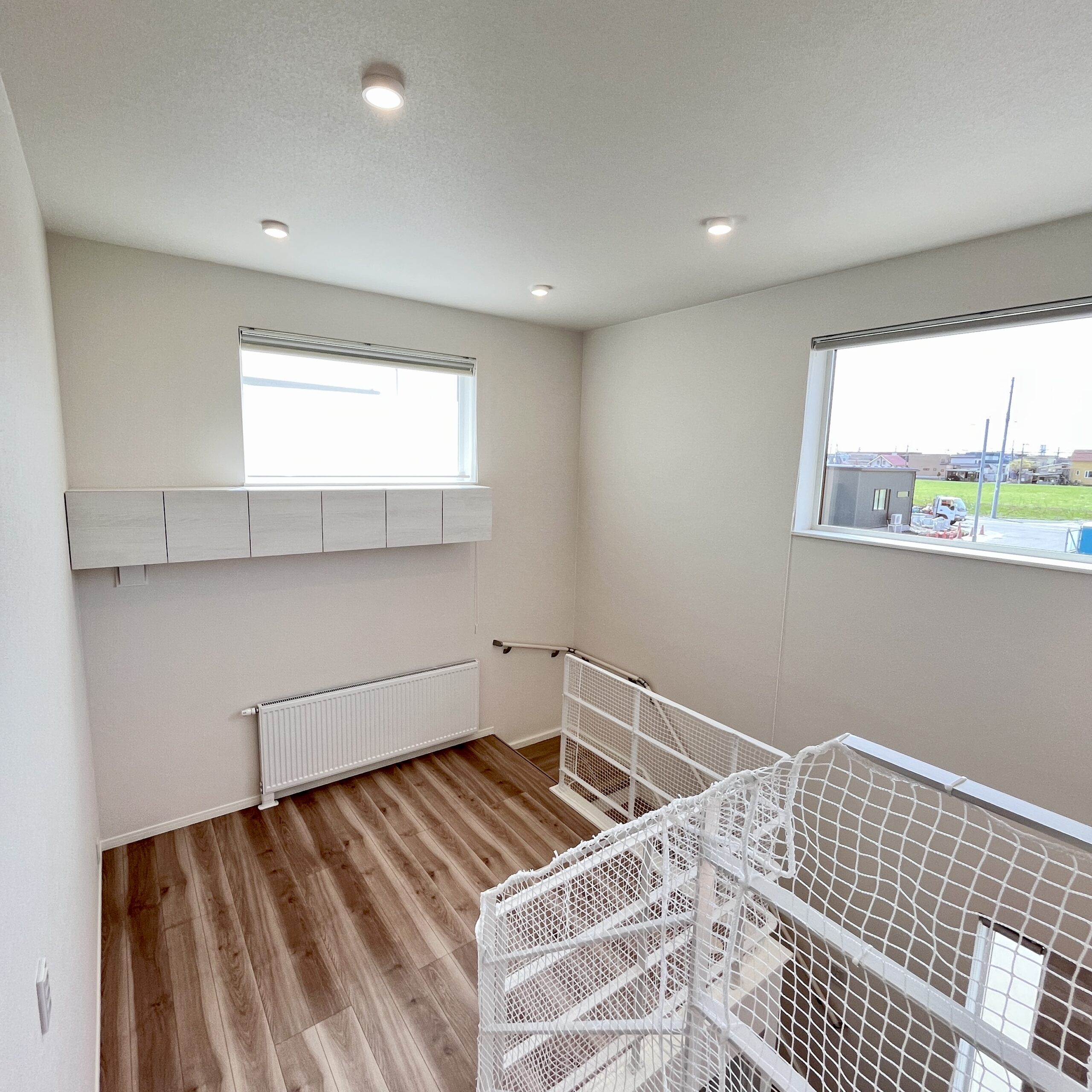 吹き抜け ✕ スキップフロア　立体感豊かなリビング空間